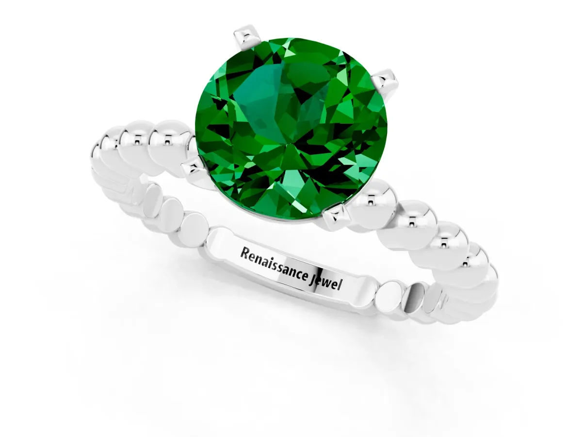 Round Cut Emerald Solitaire Ring with Beaded Band and Prong Setting Silver