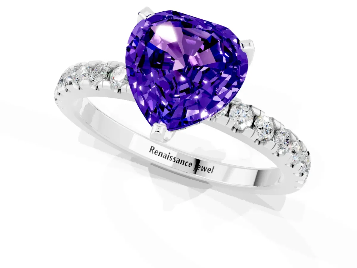 Heart Cut Tanzanite Solitaire Ring with Round Pavé Band and Four-Prong Setting Silver