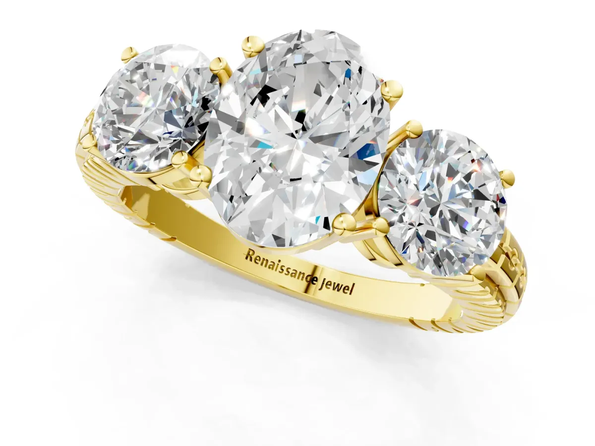 Three-Stone Oval Cut Cut Diamond Ring with Channel-Set Band and Prong Setting Yellow gold