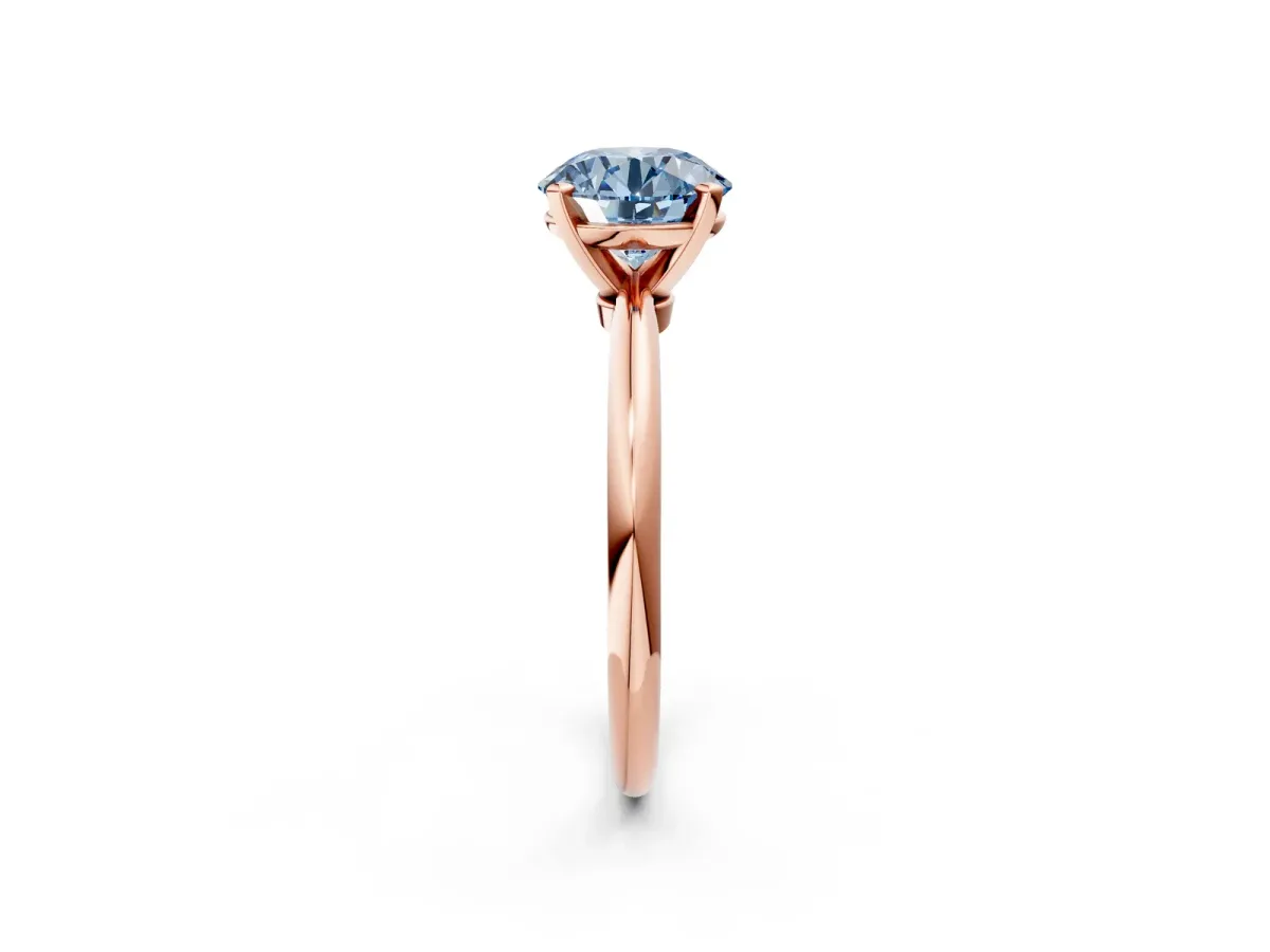 Fancy Blue Round Cut Diamond Solitaire Ring with Six-Prong Setting and Classic Band Rose gold