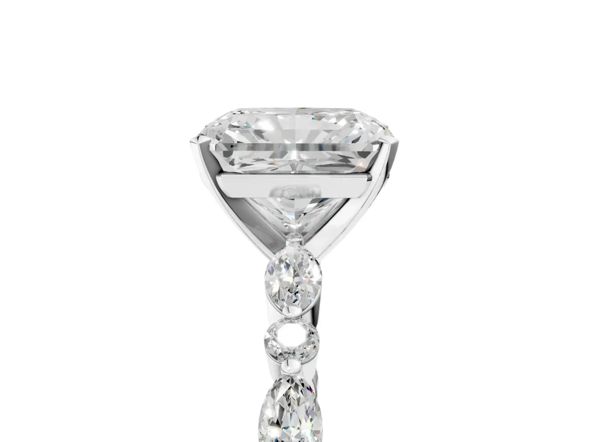 Radiant Cut Diamond Ring with Marquise and Round Side Stones and Four-Prong Setting Silver