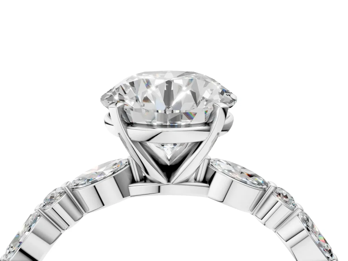 Round Cut Diamond Ring with Marquise and Round Side Stones and Four-Prong Setting Silver