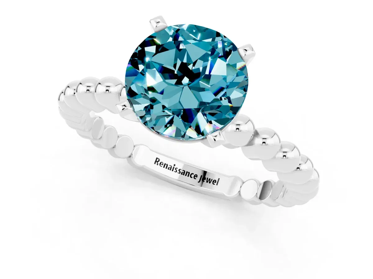 Round Cut Blue Topaz Solitaire Ring with Beaded Band and Prong Setting Silver