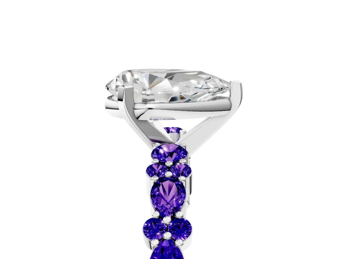 Pear Cut Diamond Side Stone Solitaire Ring with Round Tanzanite and Four-Prong Setting Silver