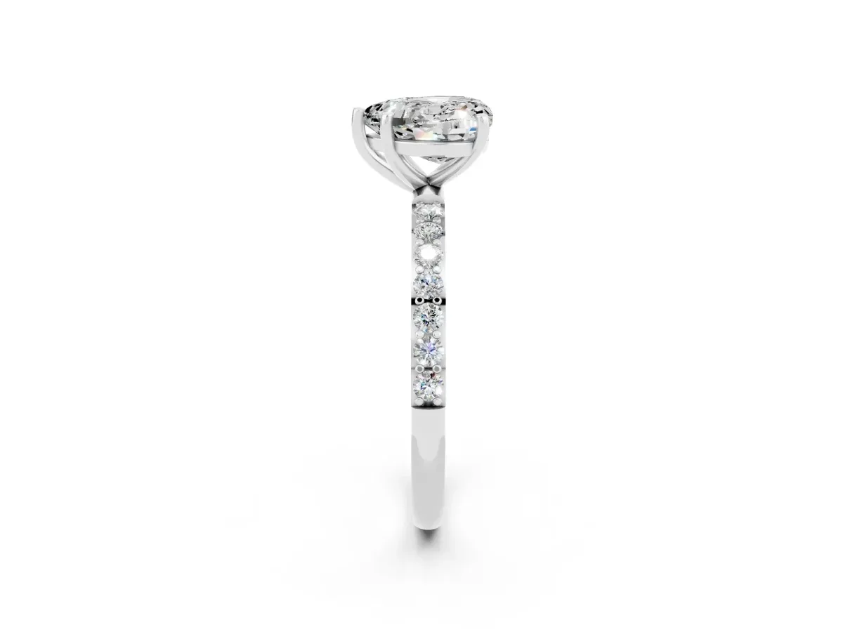 Heart Cut Moissanite Solitaire Ring with Round Pavé Band and Prong Setting Silver