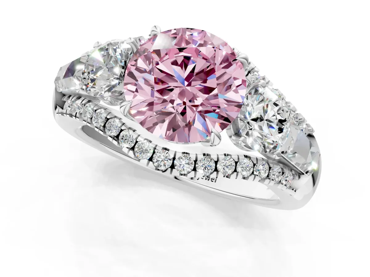 Fancy Pink Three-Stone Round Cut Diamond Engagement Ring with Pave Band and Prong Setting Platinum