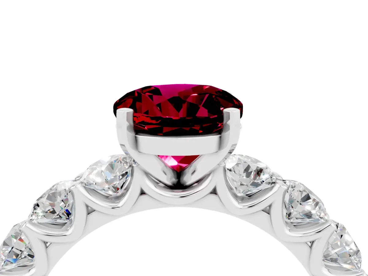 Round Cut Garnet Prong Setting with Side Stones on a Pave Band Platinum