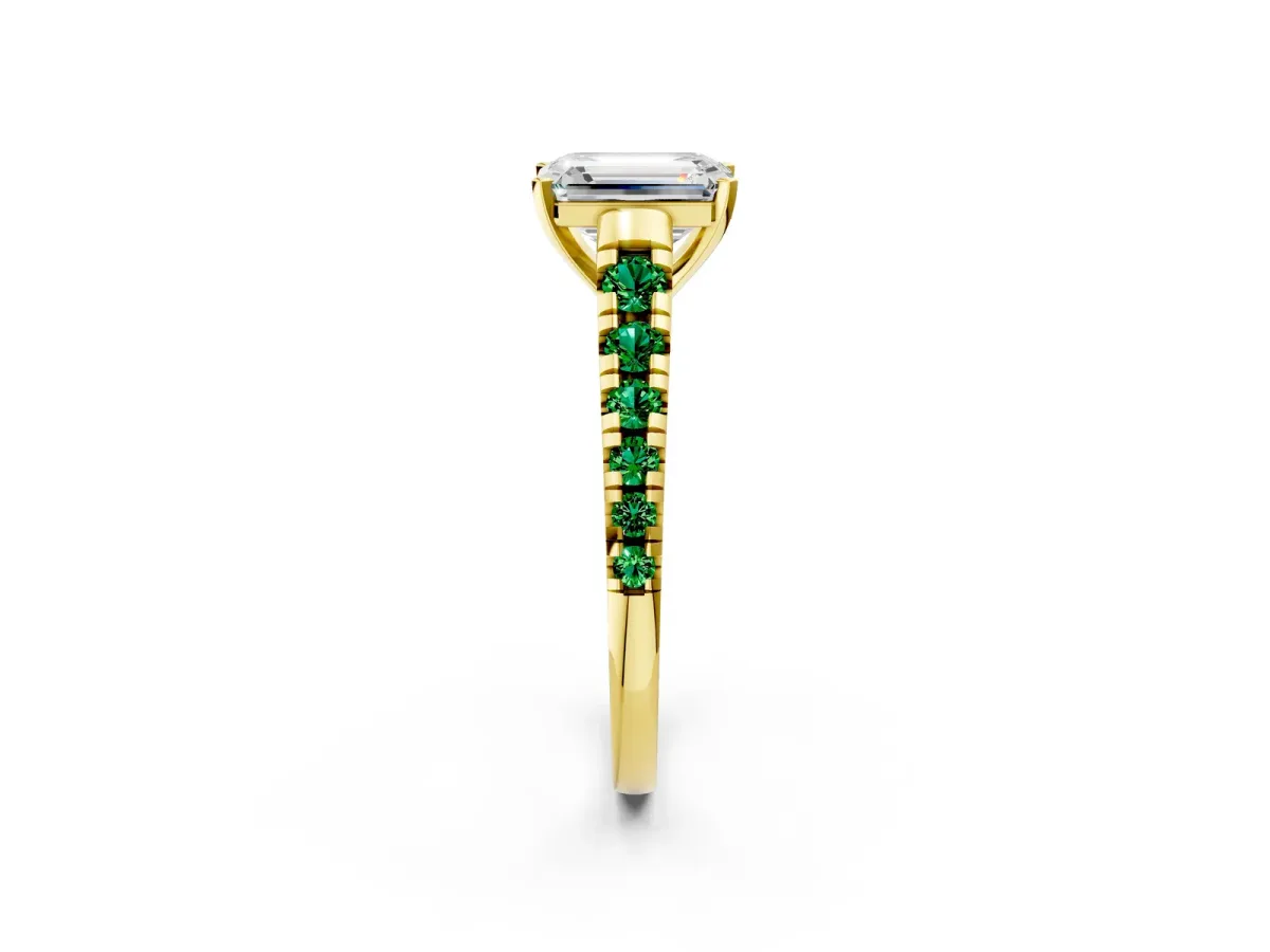 Emerald Cut Diamond Cathedral Solitaire Ring with Round Emerald Pavé Band Yellow gold