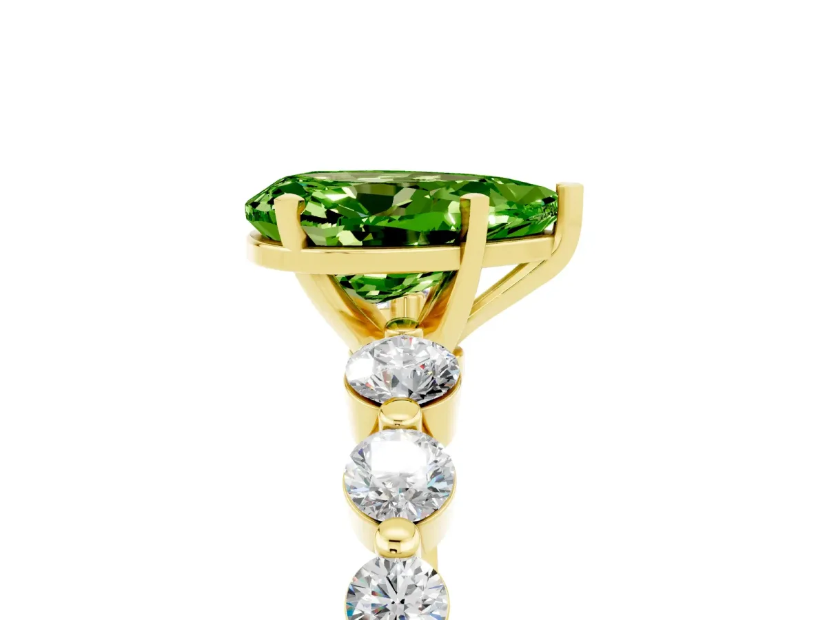 Pear Cut Solitaire Peridot Ring with Pave Band and Four-Prong Setting Yellow gold