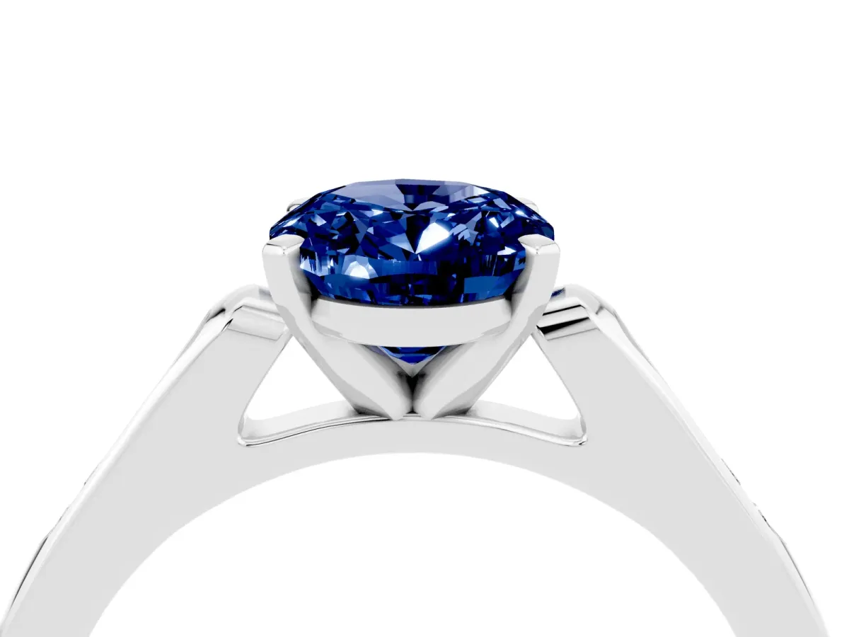 Oval Cut Blue Sapphire Solitaire Ring with Channel Set Round Band and Prong Setting Silver