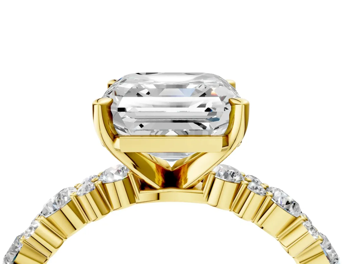Asscher Cut Diamond Side Stone Solitaire Ring with Round and Four-Prong Setting Yellow gold