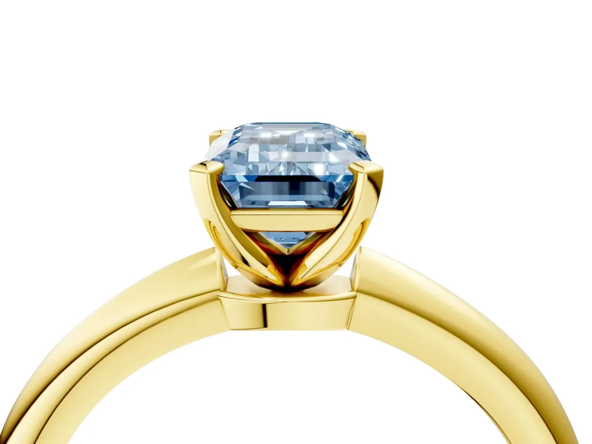 Fancy Blue Emerald Cut Diamond Solitaire Ring with Six-Prong Setting and Classic Band Yellow gold