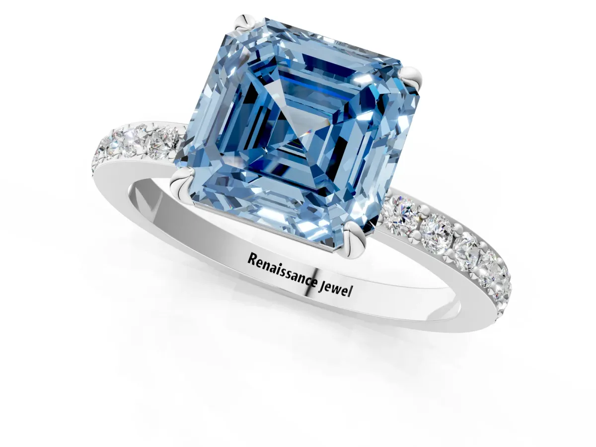 Fancy Blue Asscher Cut Diamond Solitaire Engagement Ring with Pavé Band and Four-Prong Setting Silver