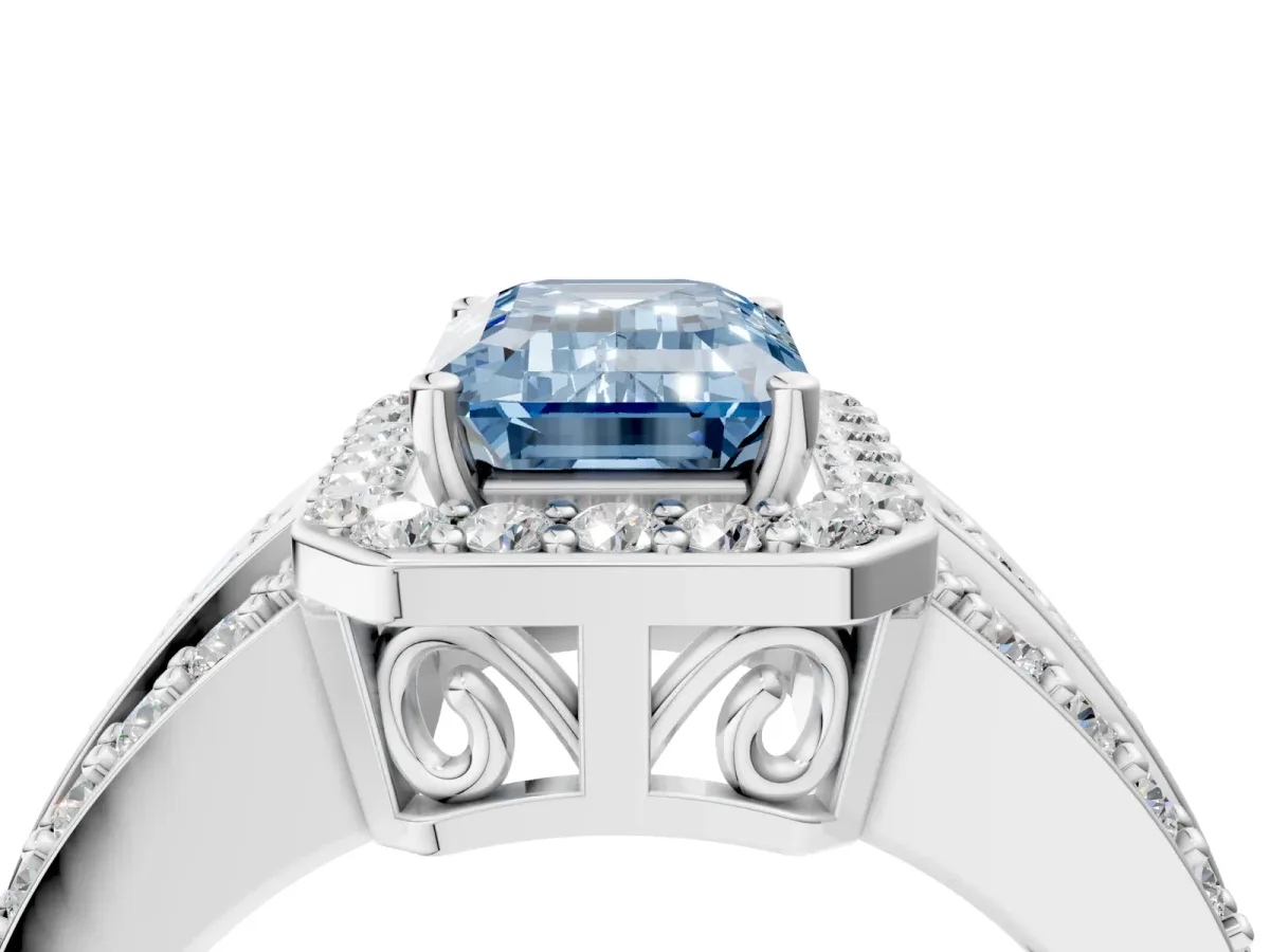 Fancy Blue Emerald Cut Halo Diamond Ring with Round Split Shank and Prong Setting Platinum