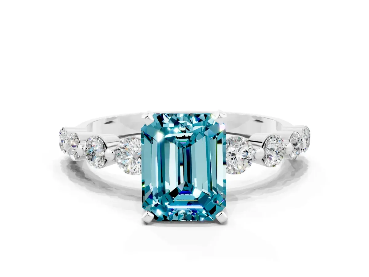 Emerald Cut Solitaire Blue Topaz Ring with Pave Band and Four-Prong Setting Silver