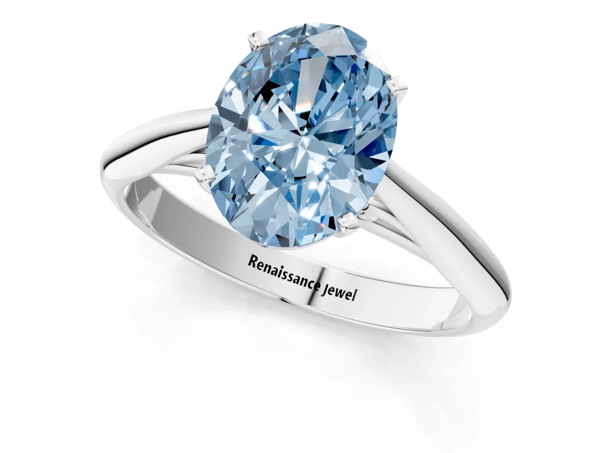 Fancy Blue Oval Cut Diamond Solitaire Engagement Ring with Cathedral Setting and Four-Prong Mount White gold