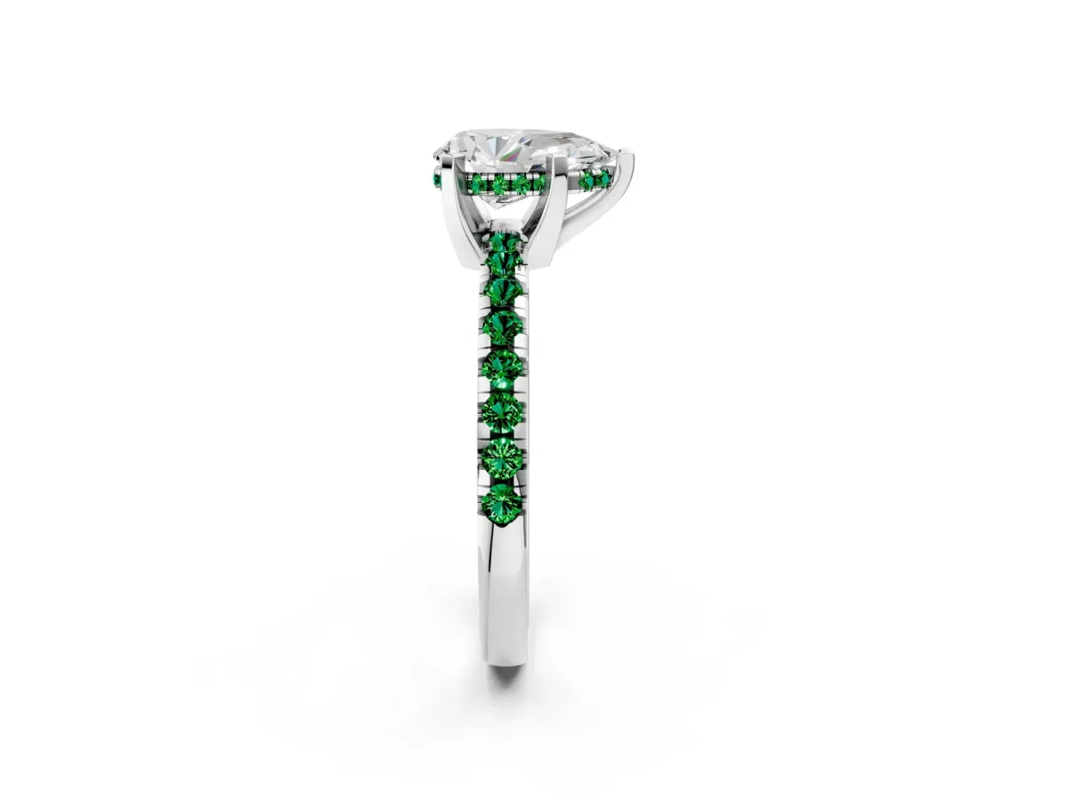 Pear Cut Diamond Solitaire Ring with Round Emerald Pavé Band and Four-Prong Setting Silver