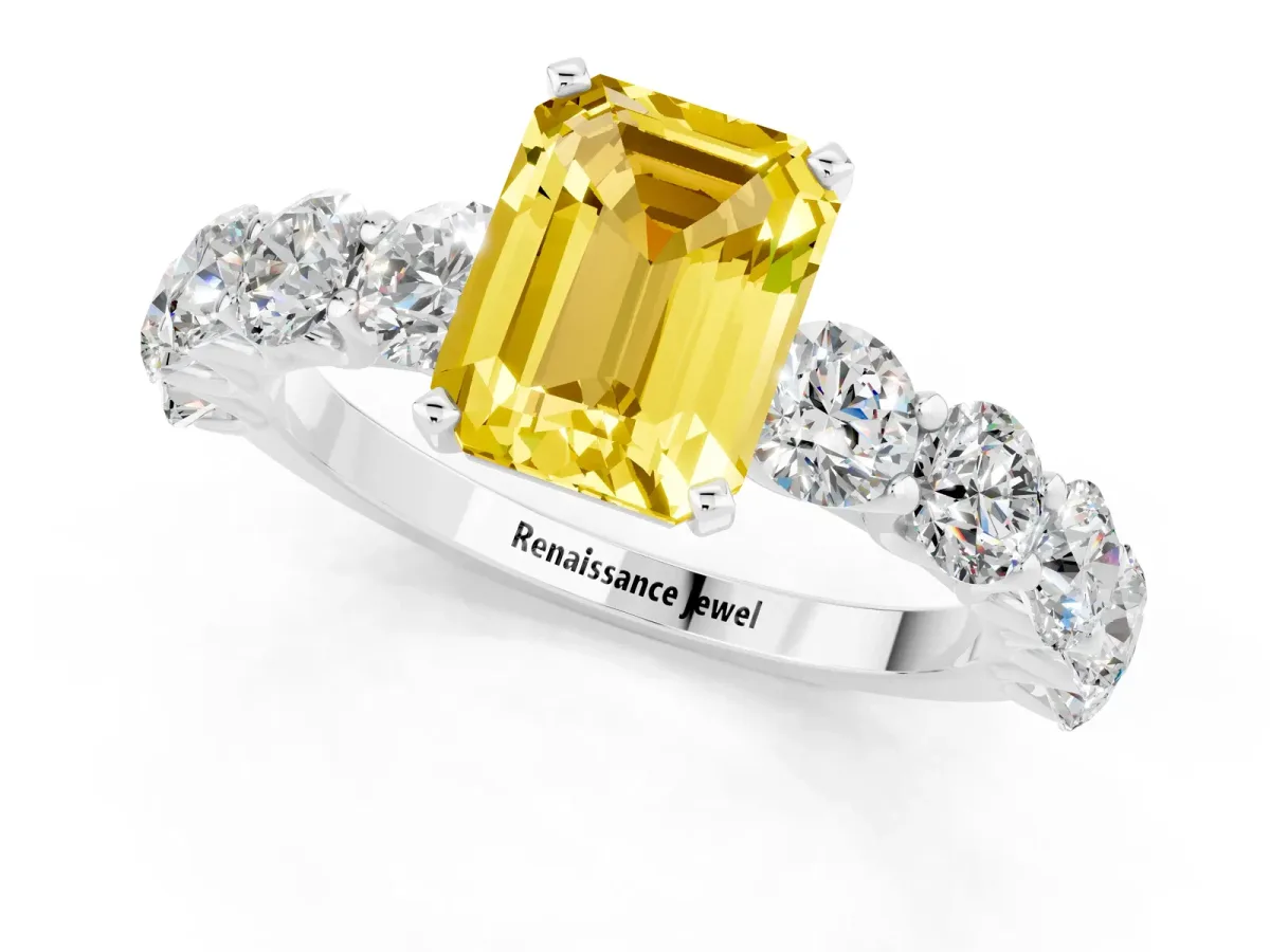 Emerald Cut Yellow Sapphire Prong Setting with Side Stones on a Pave Band Silver