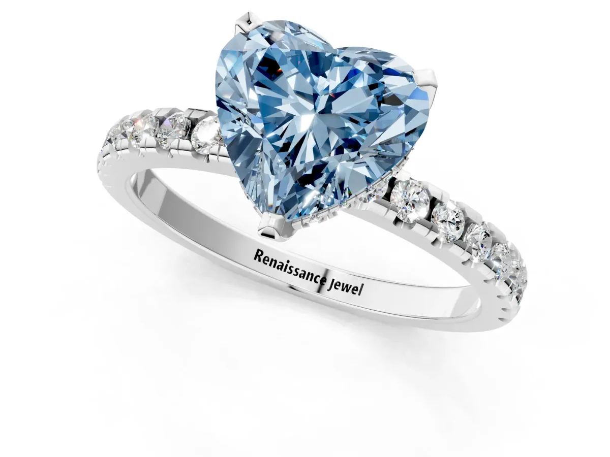 Fancy Blue Heart Cut Diamond Solitaire Ring with Round Pavé Band and Four-Prong Setting Silver