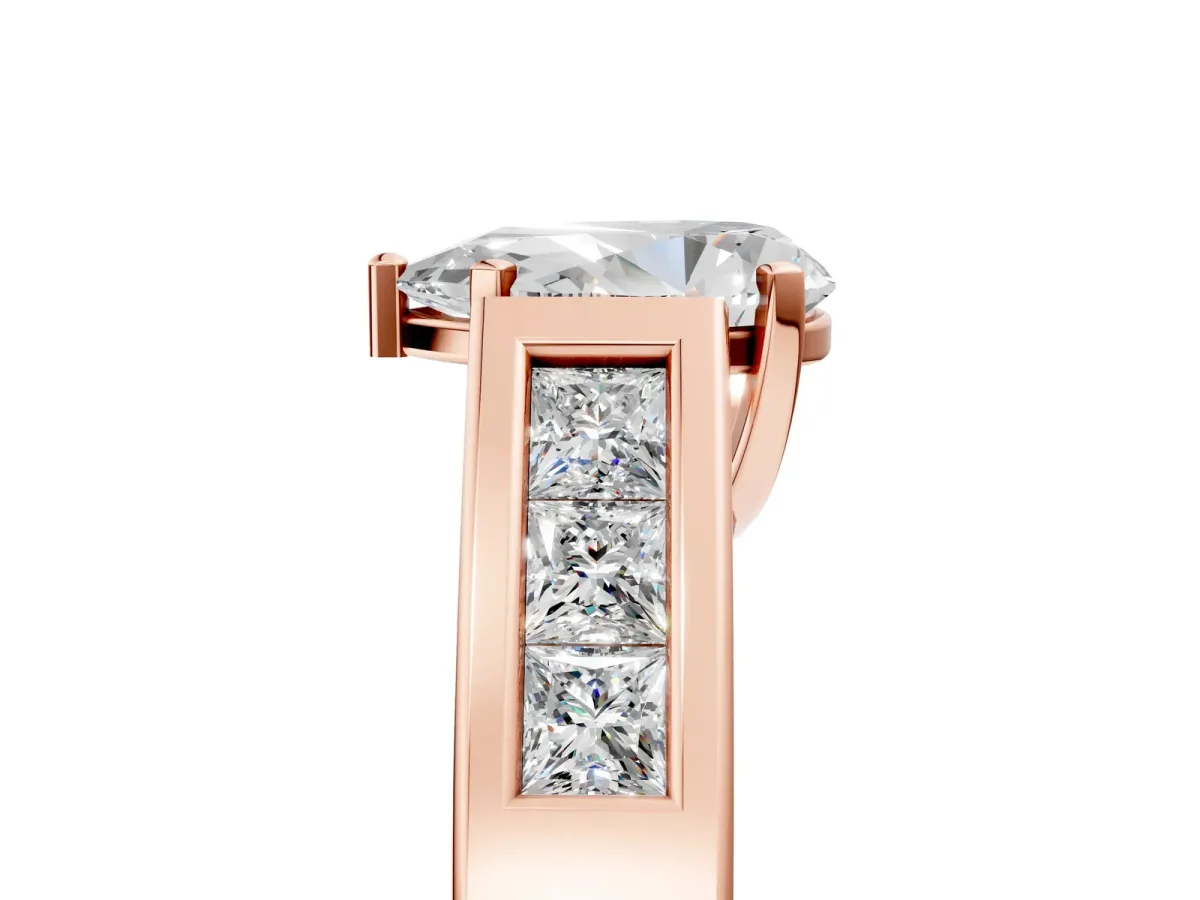 Pear Cut Cut Channel Set Solitaire Ring with Four-Prong Setting Rose gold
