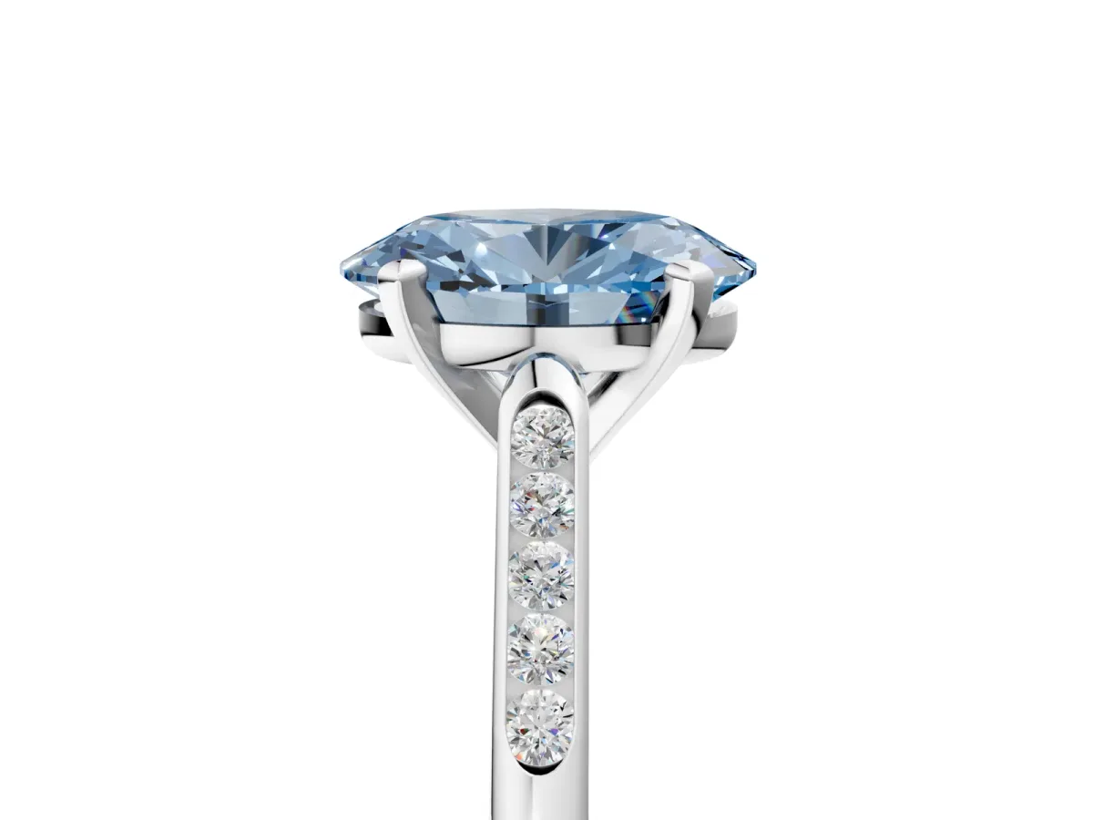 Fancy Blue Oval Cut Diamond Solitaire Ring with Channel Set Round Band and Prong Setting Silver