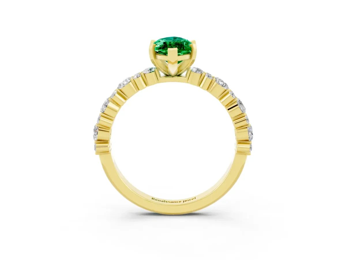 Marquise Cut Emerald Side Stone Solitaire Ring with Round and Four-Prong Setting Yellow gold