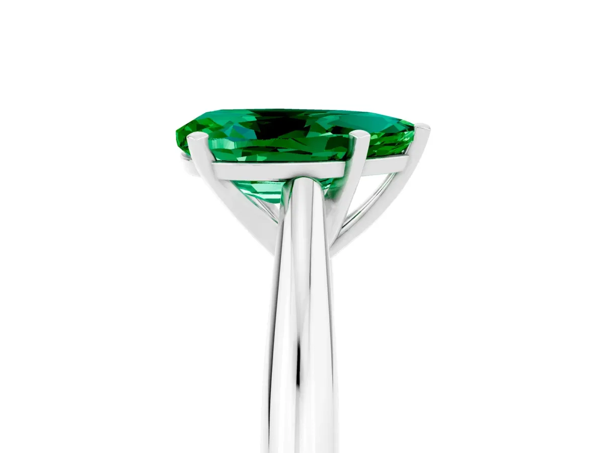 Pear Cut Emerald Solitaire Engagement Ring with Cathedral Setting and Four-Prong Mount White gold