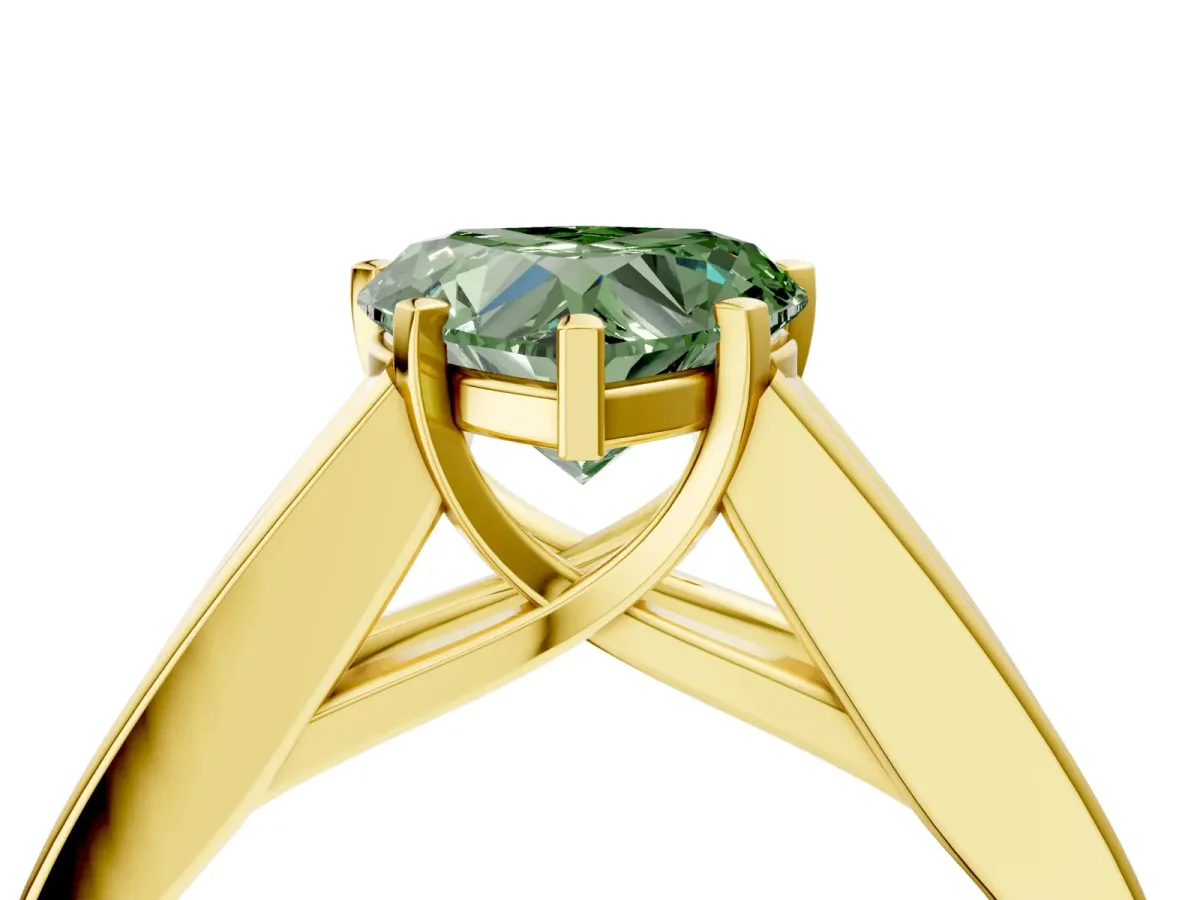 Fancy Green Heart Cut Cut Channel Set Solitaire Ring with Four-Prong Setting Yellow gold