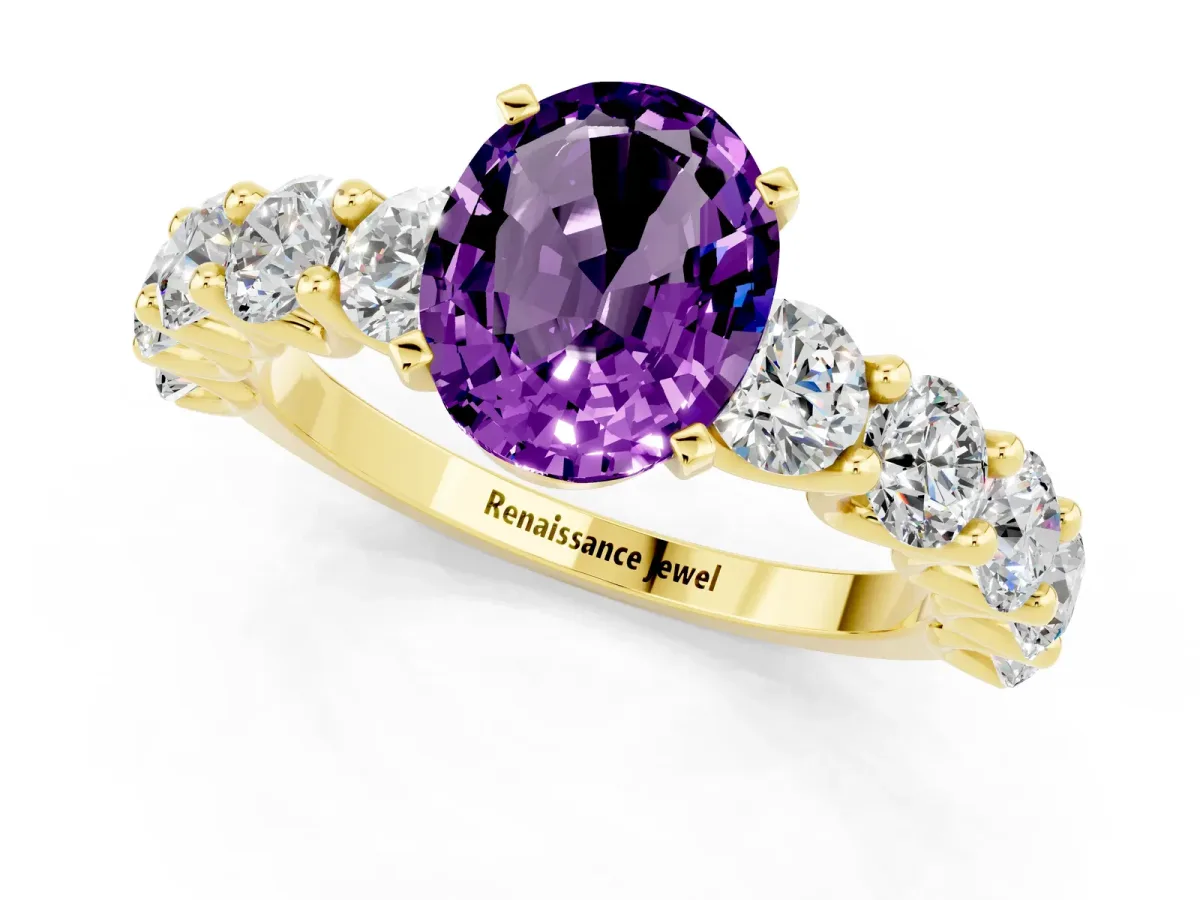 Oval Cut Amethyst Prong Setting with Side Stones on a Pave Band Yellow gold