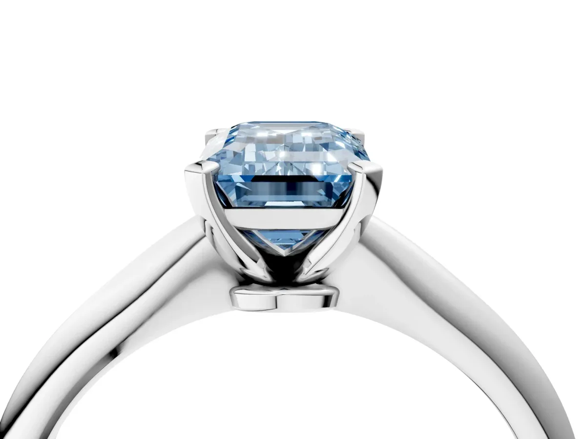 Fancy Blue Emerald Cut Diamond Solitaire Engagement Ring with Classic Band and Four-Prong Setting Silver