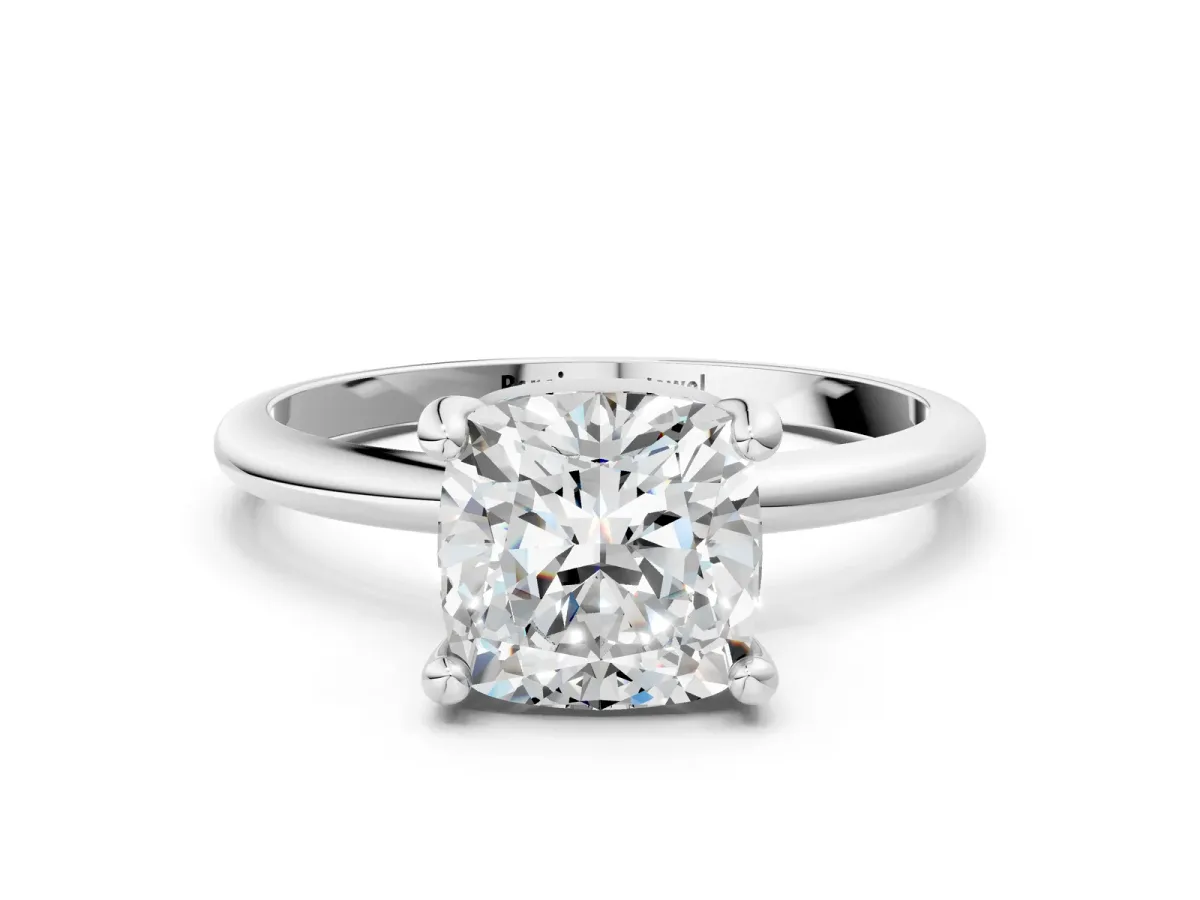 Cushion Cut Solitaire Diamond Ring with 4-Prong Setting on a Classic Band Silver