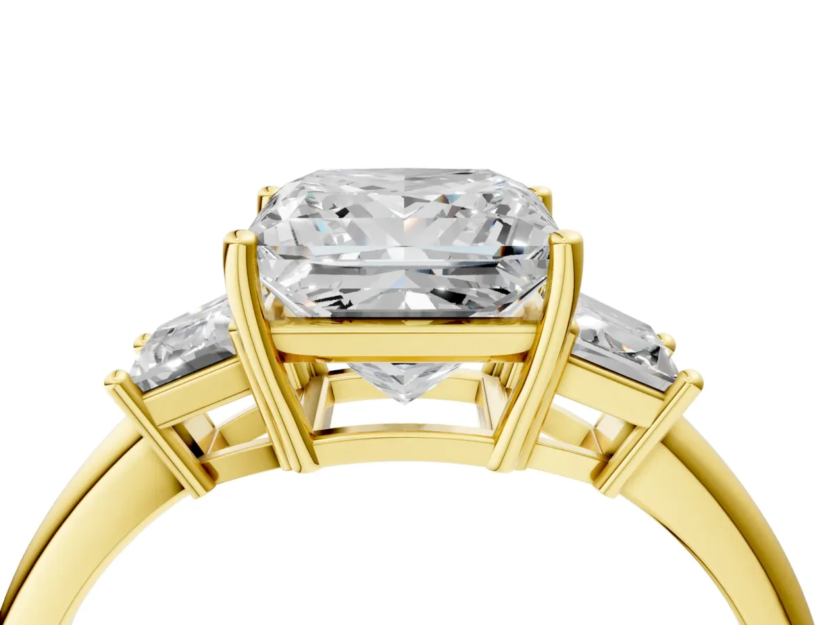 Princess Cut Diamond Three-Stone Ring with Trapezoid Side Stones and Prong Setting Yellow gold
