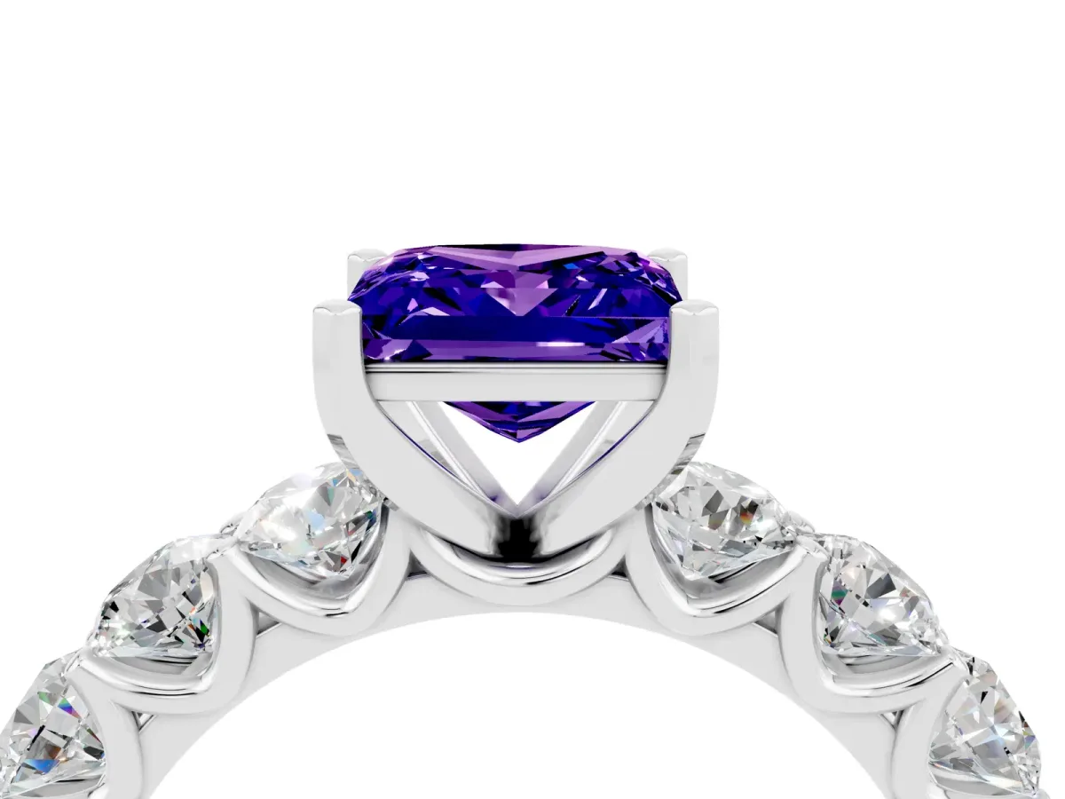 Princess Cut Tanzanite Prong Setting with Side Stones on a Pave Band Silver