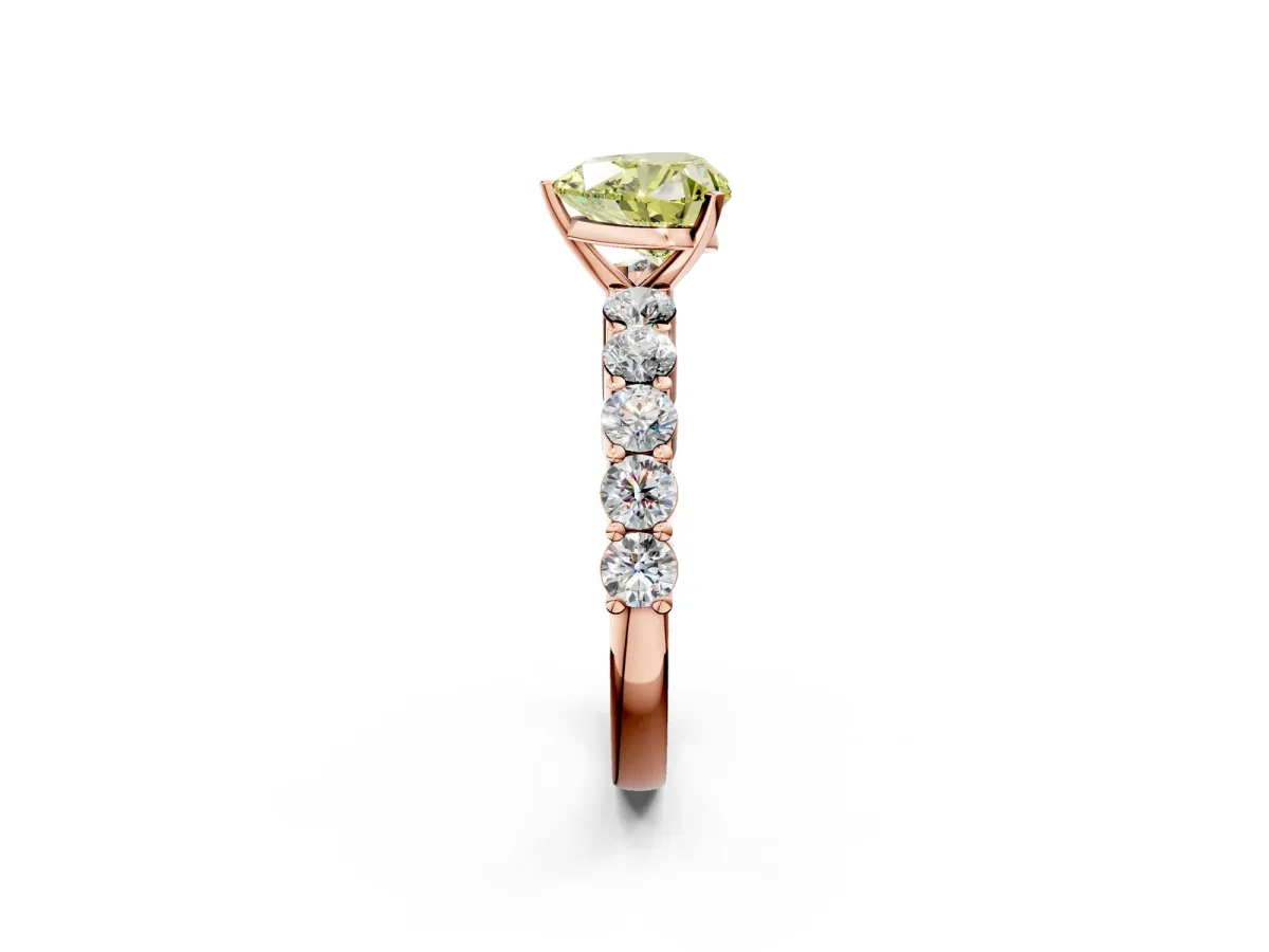 Fancy Yellow Heart Cut Diamond Solitaire Ring with Shared Prong Round Side Stones Rose gold