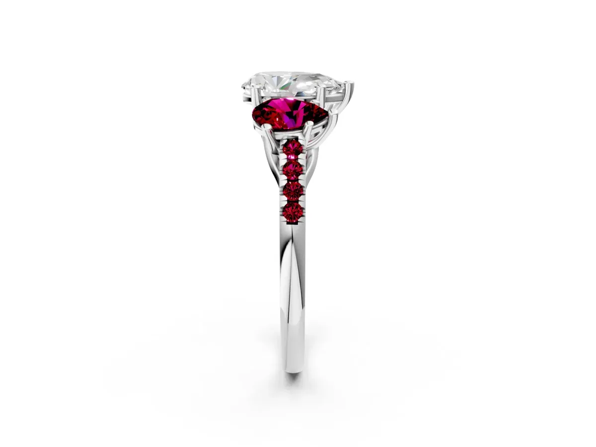 Three-Stone Pear Cut Diamond Ring with Round Garnet Pavé Band and Prong Setting Platinum