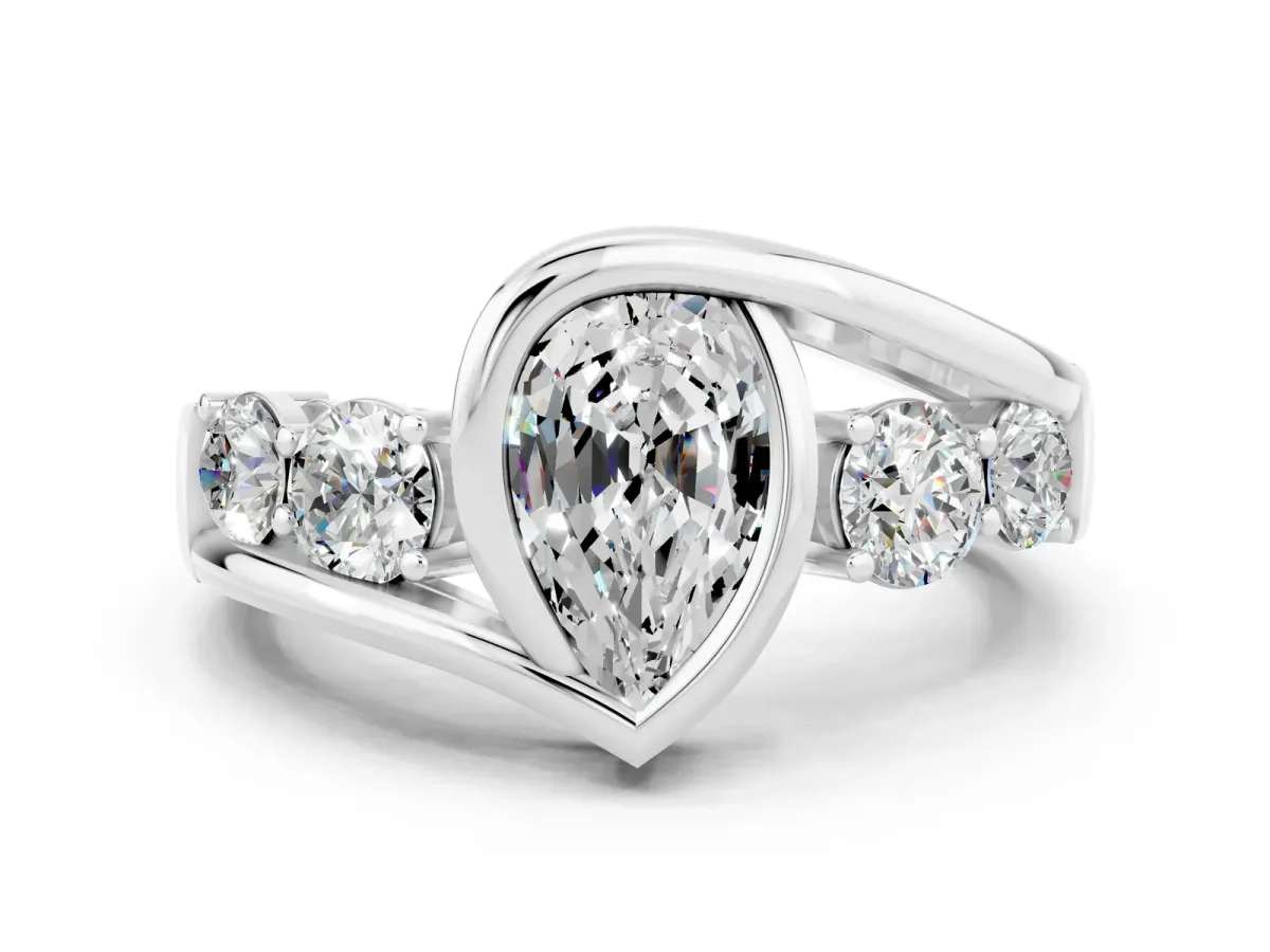 Bezel Set Pear Cut Moissanite Bypass Ring with Round Accents Silver