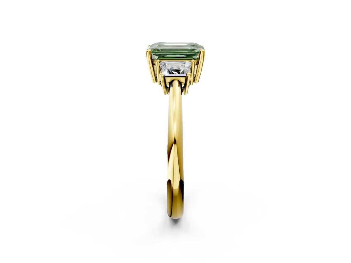 Fancy Green Emerald Cut Diamond Three-Stone Ring with Trapezoid Side Stones and Prong Setting Yellow gold