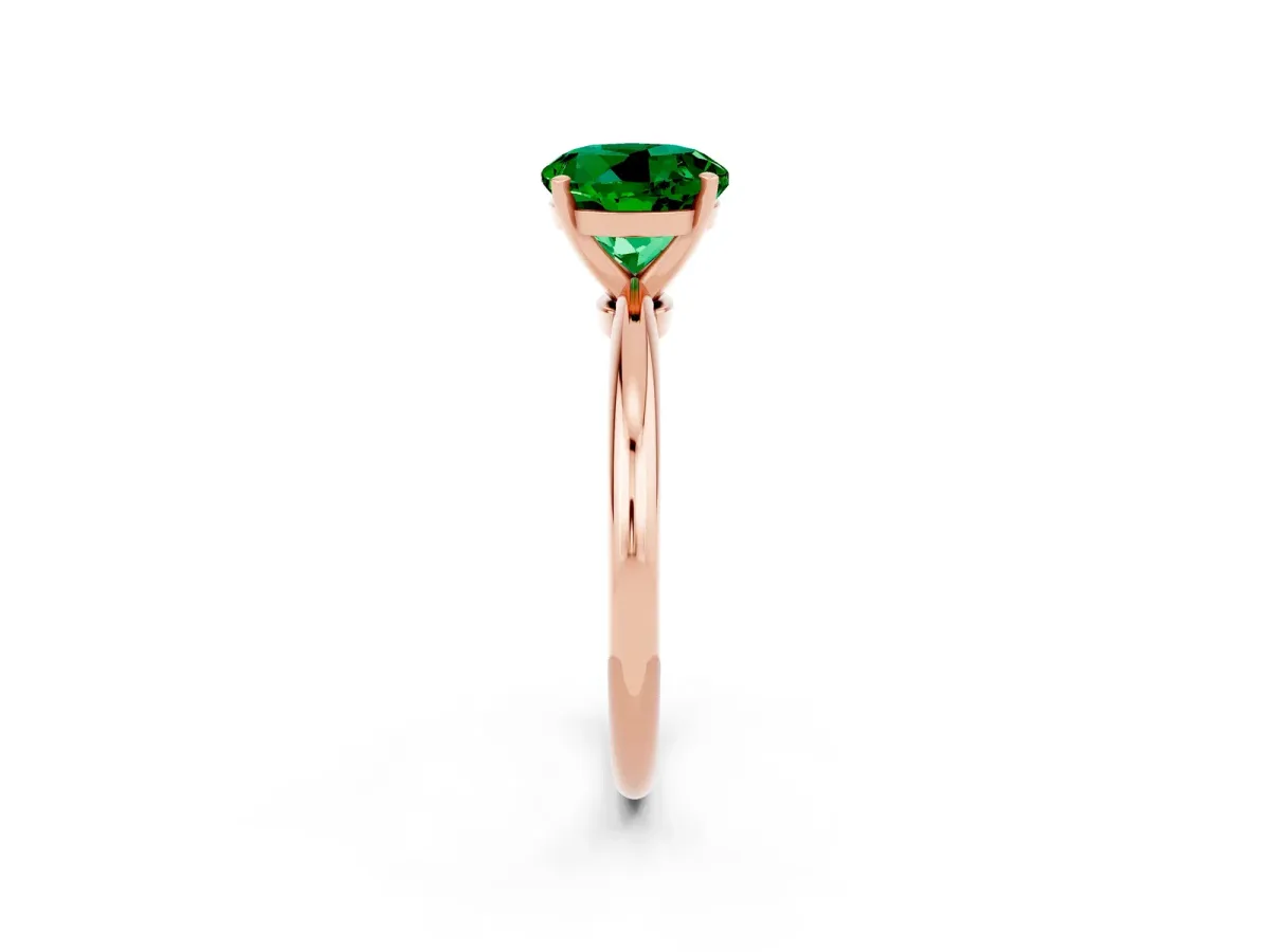 Round Cut Emerald Solitaire Ring with Six-Prong Setting and Classic Band Rose gold
