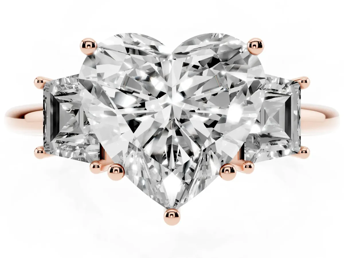 Heart Cut Diamond Three-Stone Ring with Trapezoid Side Stones and Prong Setting Rose gold