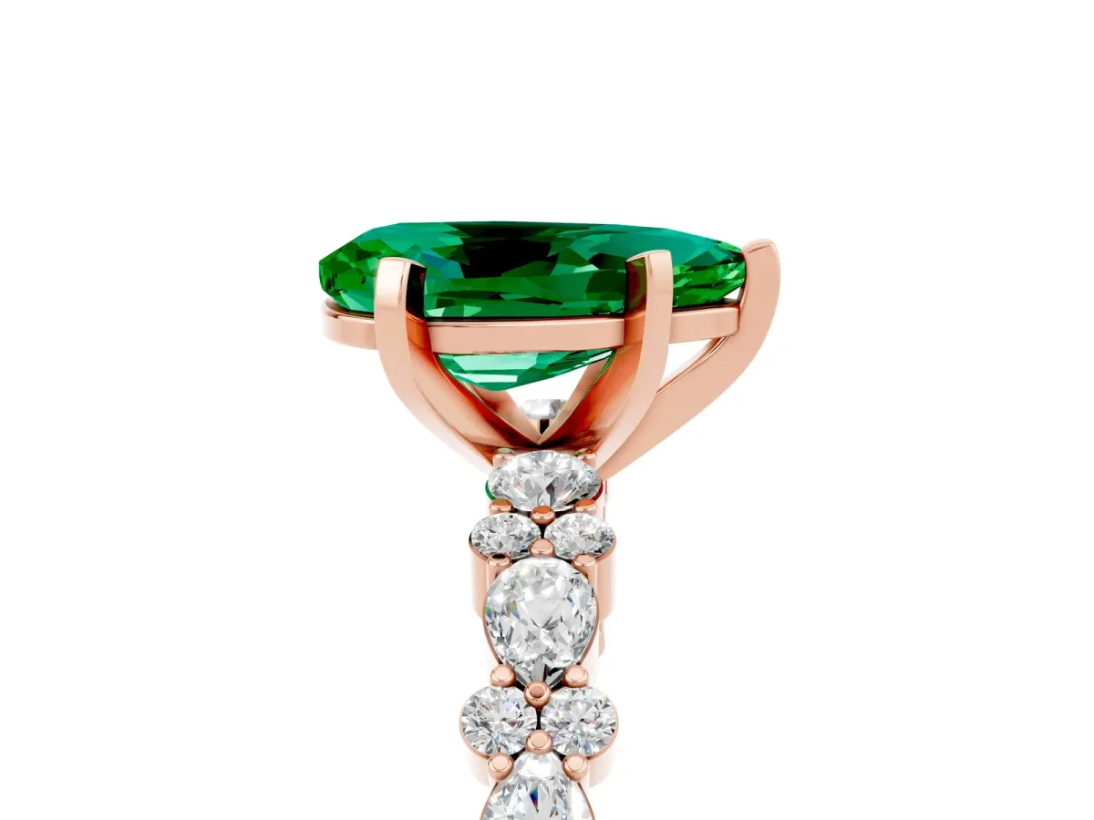 Pear Cut Emerald Side Stone Solitaire Ring with Round and Four-Prong Setting Rose gold