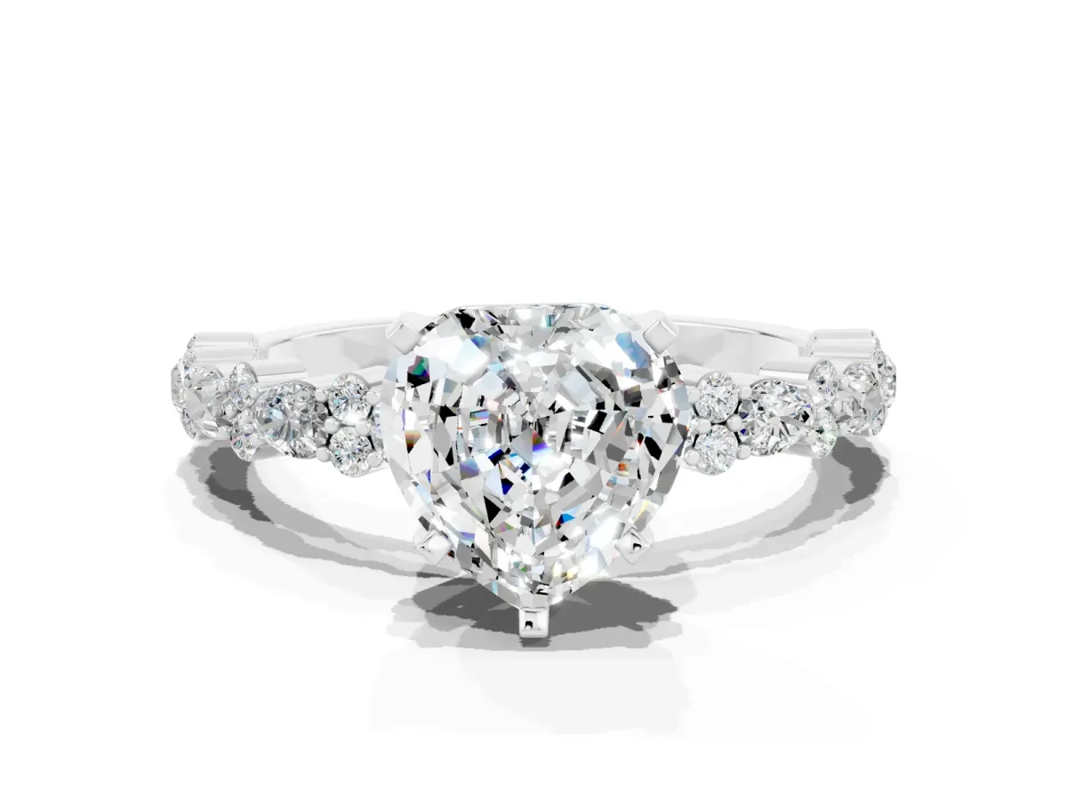 Heart Cut Moissanite Side Stone Solitaire Ring with Round and Four-Prong Setting Silver