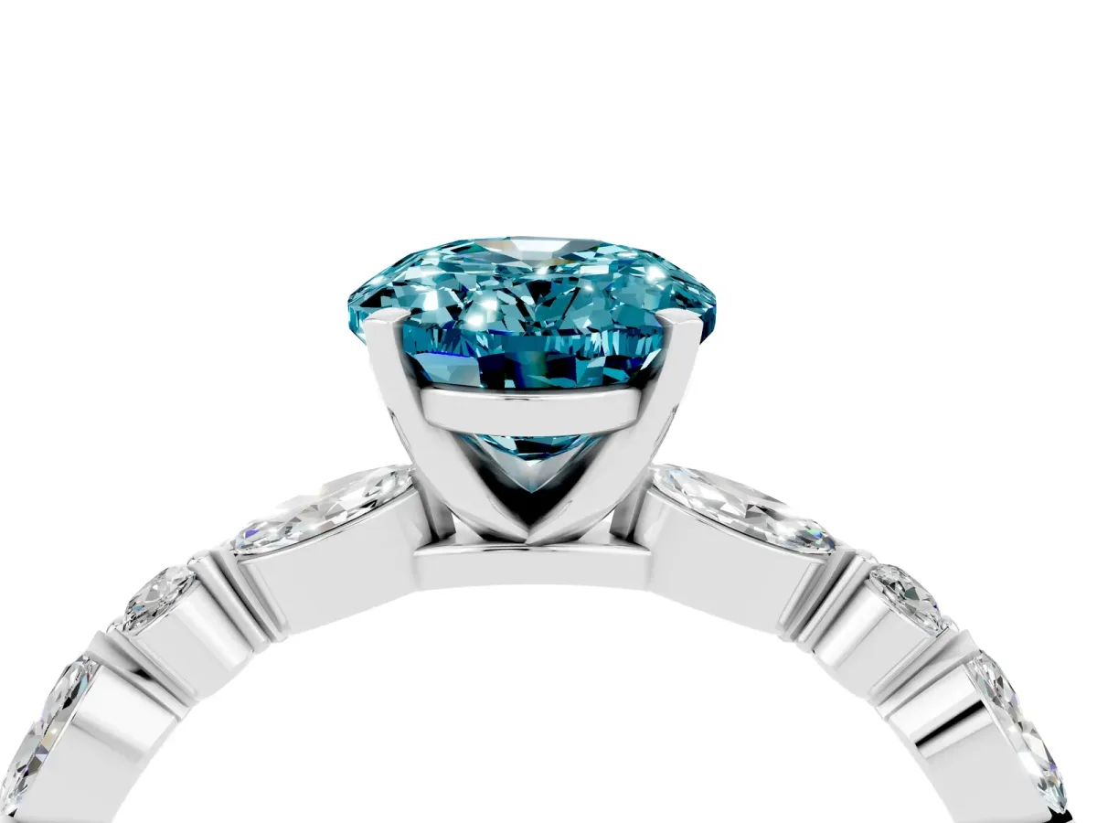 Oval Cut Blue Topaz Ring with Marquise and Round Side Stones and Four-Prong Setting Silver