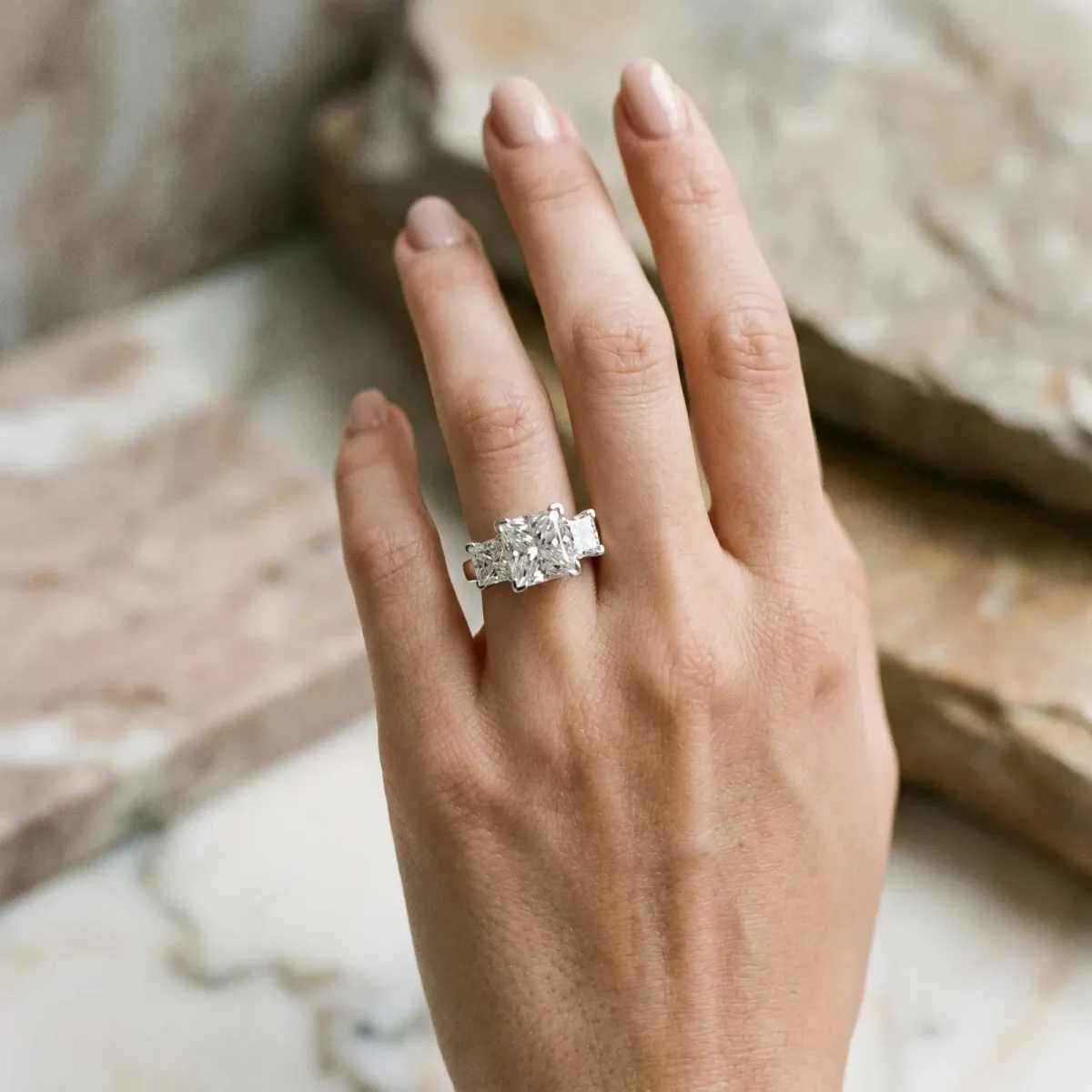 Three-Stone Radiant Cut Cut Diamond Ring with Channel Set Band and Four-Prong Setting Silver