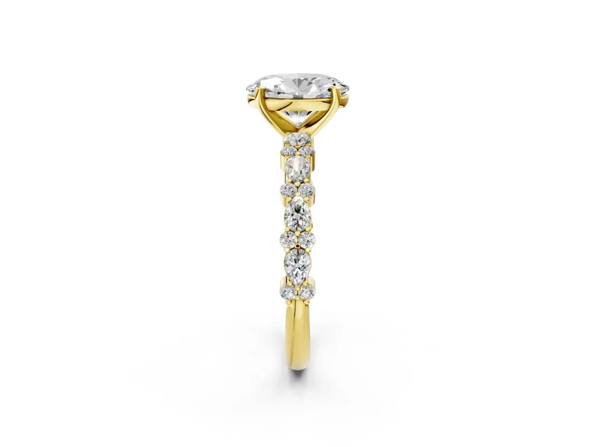 Oval Cut Diamond Side Stone Solitaire Ring with Round and Four-Prong Setting Yellow gold