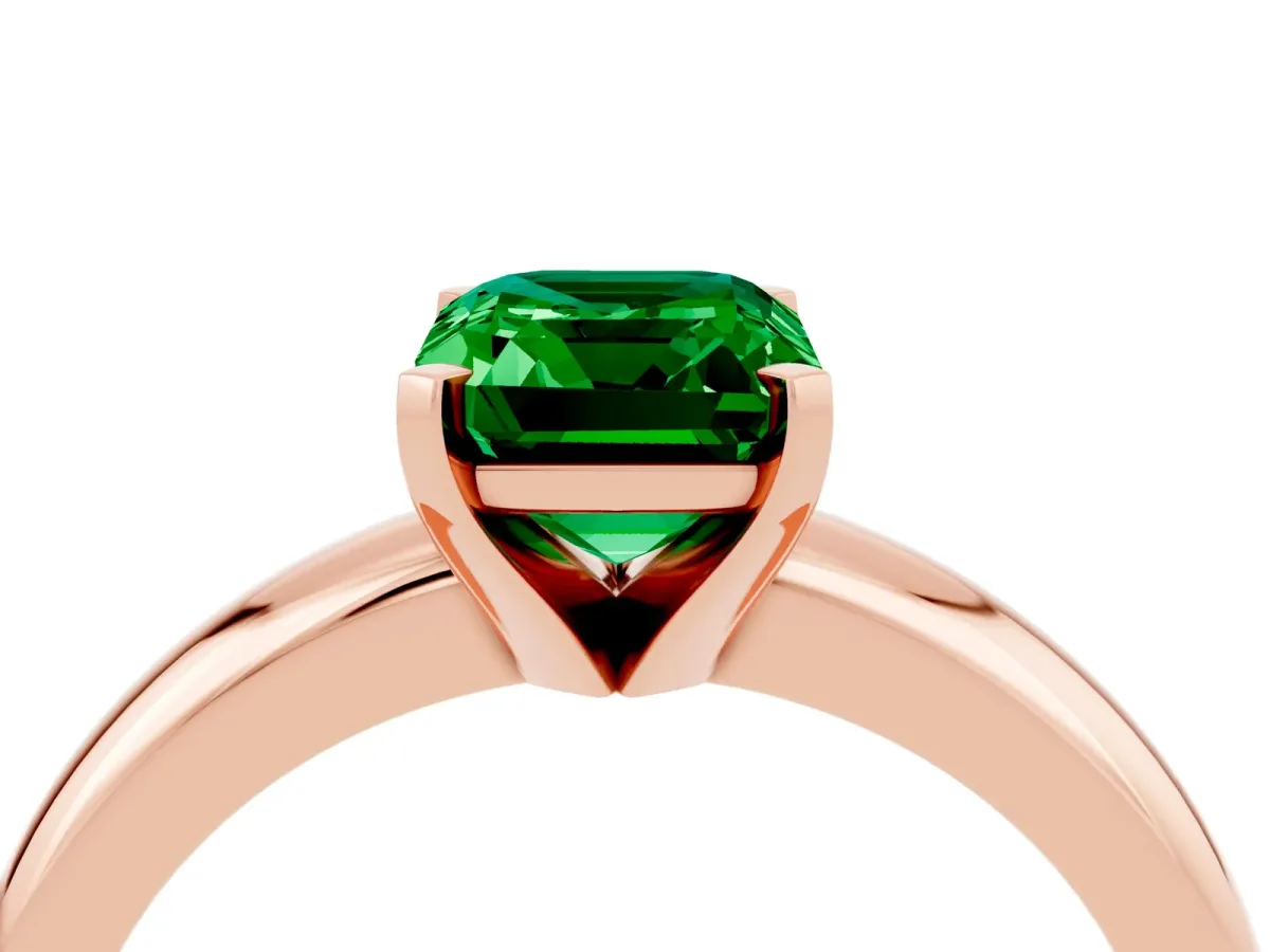 Emerald Cut Emerald Solitaire Engagement Ring with Round Band and Four-Prong Setting Rose gold