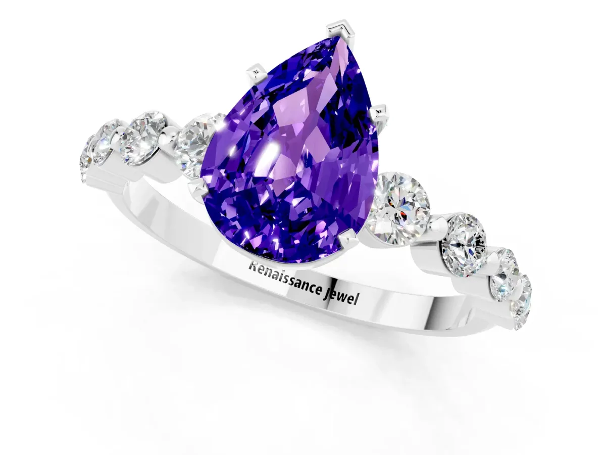 Pear Cut Solitaire Tanzanite Ring with Pave Band and Four-Prong Setting Platinum