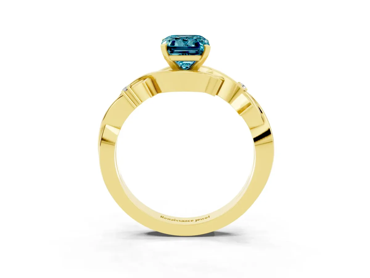 Emerald Cut Blue Topaz Solitaire Ring with Twisted Band and Prong Setting Yellow gold