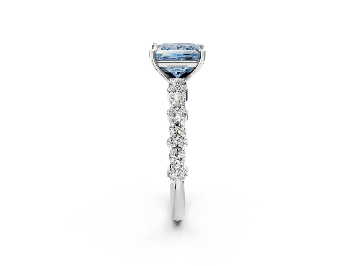 Fancy Blue Princess Cut Diamond Side Stone Solitaire Ring with Round and Four-Prong Setting Platinum