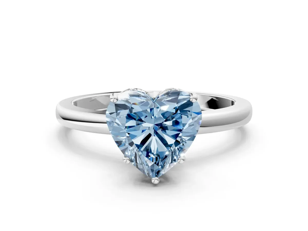Fancy Blue Heart Cut Solitaire Diamond Ring with Prong Setting and Plain Band Silver