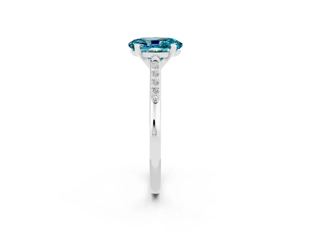 Oval Cut Blue Topaz Solitaire Ring with Channel Set Round Band and Prong Setting Silver
